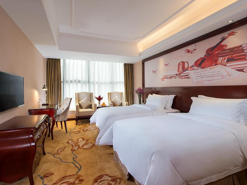 Vienna Hotel Shenzhen Shuiku New Village Exterior photo
